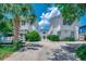 Charming exterior of connected home with concrete drive and mature landscaping at 2309 Withers Dr. # 5, Myrtle Beach, SC 29577
