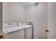 Laundry room area featuring washer and dryer hookups and storage space at 2309 Withers Dr. # 5, Myrtle Beach, SC 29577