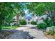 Exterior of a charming townhouse with lush landscaping and driveway at 2309 Withers Dr. # 7, Myrtle Beach, SC 29577