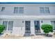 The exterior of the building is white with many windows and a small bush in front at 2309 Withers Dr. # 7, Myrtle Beach, SC 29577