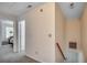 Upstairs hallway with carpet flooring and white walls leads to bedrooms at 2309 Withers Dr. # 7, Myrtle Beach, SC 29577