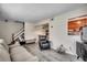 The living room has gray vinyl flooring and a staircase to the side at 2309 Withers Dr. # 7, Myrtle Beach, SC 29577