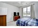 Bedroom featuring neutral walls, ceiling fan, and a dresser with a television at 2315 Blackthorn Dr., Conway, SC 29526