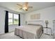 Bright bedroom with a ceiling fan, window, and neutral decor creates a peaceful retreat at 2315 Blackthorn Dr., Conway, SC 29526