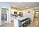 Modern kitchen featuring an island with seating, stainless steel appliances, and stylish cabinetry at 2315 Blackthorn Dr., Conway, SC 29526