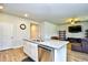 Modern kitchen features stainless steel dishwasher and granite countertops on the kitchen island at 2315 Blackthorn Dr., Conway, SC 29526
