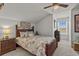 Comfortable bedroom with a stylish bed, warm lighting, and serene decor for a relaxing atmosphere at 2318 Via Palma Dr., North Myrtle Beach, SC 29582