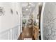 Inviting foyer featuring hardwood floors, decorative lighting, and elegant decor, leading into the home's living space at 2318 Via Palma Dr., North Myrtle Beach, SC 29582