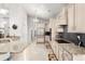 Bright kitchen featuring granite countertops, stainless steel appliances, and custom cabinetry for a modern aesthetic at 2318 Via Palma Dr., North Myrtle Beach, SC 29582