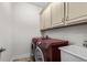 Well-equipped laundry room with modern appliances, ample storage, and a convenient sink at 2318 Via Palma Dr., North Myrtle Beach, SC 29582