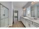 Elegant bathroom with dual sinks, walk-in shower, and modern fixtures at 245 Nw Mayflower Dr., Calabash, NC 28467