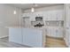 Modern kitchen featuring an island, stainless steel appliances and pendant lighting at 245 Nw Mayflower Dr., Calabash, NC 28467