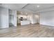 Bright living area with luxury vinyl flooring, open floor plan, and recessed lighting at 245 Nw Mayflower Dr., Calabash, NC 28467
