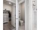 Bathroom view highlighting a walk-in closet and adjacent toilet room with white marble flooring at 2572 Brescia St., Myrtle Beach, SC 29579
