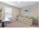 Cozy bedroom with a daybed featuring floral patterns, a work desk, and decorative artwork at 2572 Brescia St., Myrtle Beach, SC 29579