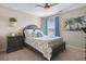 Comfortable bedroom with coastal decor, a decorative headboard, and natural light from a window at 2572 Brescia St., Myrtle Beach, SC 29579
