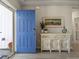 Inviting entryway featuring a blue door and decorative console table at 2572 Brescia St., Myrtle Beach, SC 29579