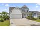 Charming two-story home with a two car garage and inviting front yard at 2572 Brescia St., Myrtle Beach, SC 29579