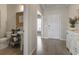 Functional hallway area with a small sink and decorative mirror at 2572 Brescia St., Myrtle Beach, SC 29579