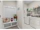 Convenient laundry room featuring storage, washer, and dryer units at 2572 Brescia St., Myrtle Beach, SC 29579