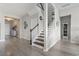 Staircase with wooden treads and white risers, blending traditional design with modern elegance at 2572 Brescia St., Myrtle Beach, SC 29579