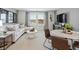 Comfortable living room space with a large window and stylish decor at 2606 Tranquility Loop, Longs, SC 29568