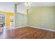 Open living space featuring hardwood floors, bright walls, and seamless flow to the kitchen at 264 La Patos Dr., Myrtle Beach, SC 29588