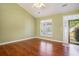 Bright living room offers hardwood floors and ample natural light from the large window at 264 La Patos Dr., Myrtle Beach, SC 29588