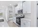 Kitchen with stainless steel appliances, gas range, modern microwave, and beautiful cabinetry at 2700 Tranquility Loop, Longs, SC 29568