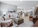 Inviting living room with modern decor and an open flow to the kitchen at 2708 Tranquility Loop, Longs, SC 29568