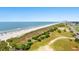 Enjoy this aerial view of the beach and nearby community at 2801 S Ocean Blvd. # 941, North Myrtle Beach, SC 29582