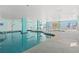 Inviting indoor pool area with lounge chairs, a hot tub and ocean views at 2801 S Ocean Blvd. # 941, North Myrtle Beach, SC 29582