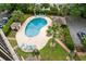 Aerial view of pool, complete with chairs, tables and lounge areas at 310 73Rd Ave. N # 5B, Myrtle Beach, SC 29572