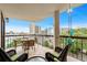 Charming balcony with wicker furniture that provides a tranquil space with ocean views at 310 73Rd Ave. N # 5B, Myrtle Beach, SC 29572