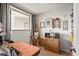 Bright bedroom with an easel and art, plenty of sunlight, and warm wood flooring at 310 73Rd Ave. N # 5B, Myrtle Beach, SC 29572