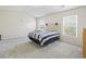 Bright bedroom featuring vaulted ceiling, two windows, and carpet floors at 314 Kiskadee Loop # 8-C, Conway, SC 29526
