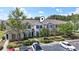 Beautifully landscaped two-story townhome with manicured lawn, blue sky and ample parking at 314 Kiskadee Loop # 8-C, Conway, SC 29526