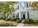 Inviting two-story townhome with well-maintained landscaping and a cozy front porch at 314 Kiskadee Loop # 8-C, Conway, SC 29526