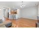 Spacious living area with hardwood floors adjacent to the kitchen and dining space at 314 Kiskadee Loop # 8-C, Conway, SC 29526