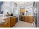 Bright kitchen with wood cabinets, stainless steel appliances, and lots of counter space at 3468 Trailside Dr., Little River, SC 29566