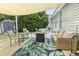 Comfortable patio area with outdoor seating, a fire pit, and a stylish rug, perfect for relaxation at 3468 Trailside Dr., Little River, SC 29566