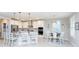 Beautiful kitchen with white cabinets, stainless steel appliances, and island seating perfect for entertaining at 383 Mikita Dr., Surfside Beach, SC 29575
