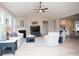 Open-concept living area with a fireplace and views to the entry, kitchen and dining areas at 383 Mikita Dr., Surfside Beach, SC 29575