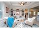 Inviting living room with coastal decor, comfortable seating, and a view of the kitchen and dining area at 383 Mikita Dr., Surfside Beach, SC 29575