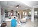 Spacious open-concept living room with seamless flow to the kitchen and dining areas, perfect for entertaining at 383 Mikita Dr., Surfside Beach, SC 29575