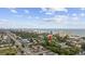 Aerial view of property near the ocean, highlighting its proximity to the beach and neighboring buildings at 403 14Th Ave. S, Myrtle Beach, SC 29572