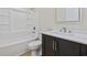 This bathroom features new fixtures including a tub/shower combo, modern vanity, and toilet at 409 2Nd Ave. S, Myrtle Beach, SC 29577