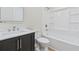 A bright bathroom with new fixtures including a tub/shower combo, vanity, and toilet at 409 2Nd Ave. S, Myrtle Beach, SC 29577