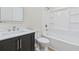 Bathroom featuring a vanity, toilet, and bathtub with shower at 409 2Nd Ave. S, Myrtle Beach, SC 29577