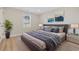 Comfortable bedroom featuring a large bed and stylish decor at 409 2Nd Ave. S, Myrtle Beach, SC 29577